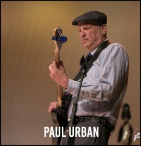 Paul Urban with guitar